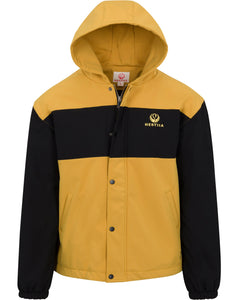 Front view of Hestiia 7K3 heated jacket. Jacket is amber, with a large black stripe across the top portion of the chest, and the Hestiia icon embroidered in a light yellow color inside the black stripe on the wearer's left side, top of chest area. Sleeves are black. Elastic bungee sleeve cuffs. Two pockets on either side of front. Snapped up storm flap with zipper visible behind it. Hood is up.